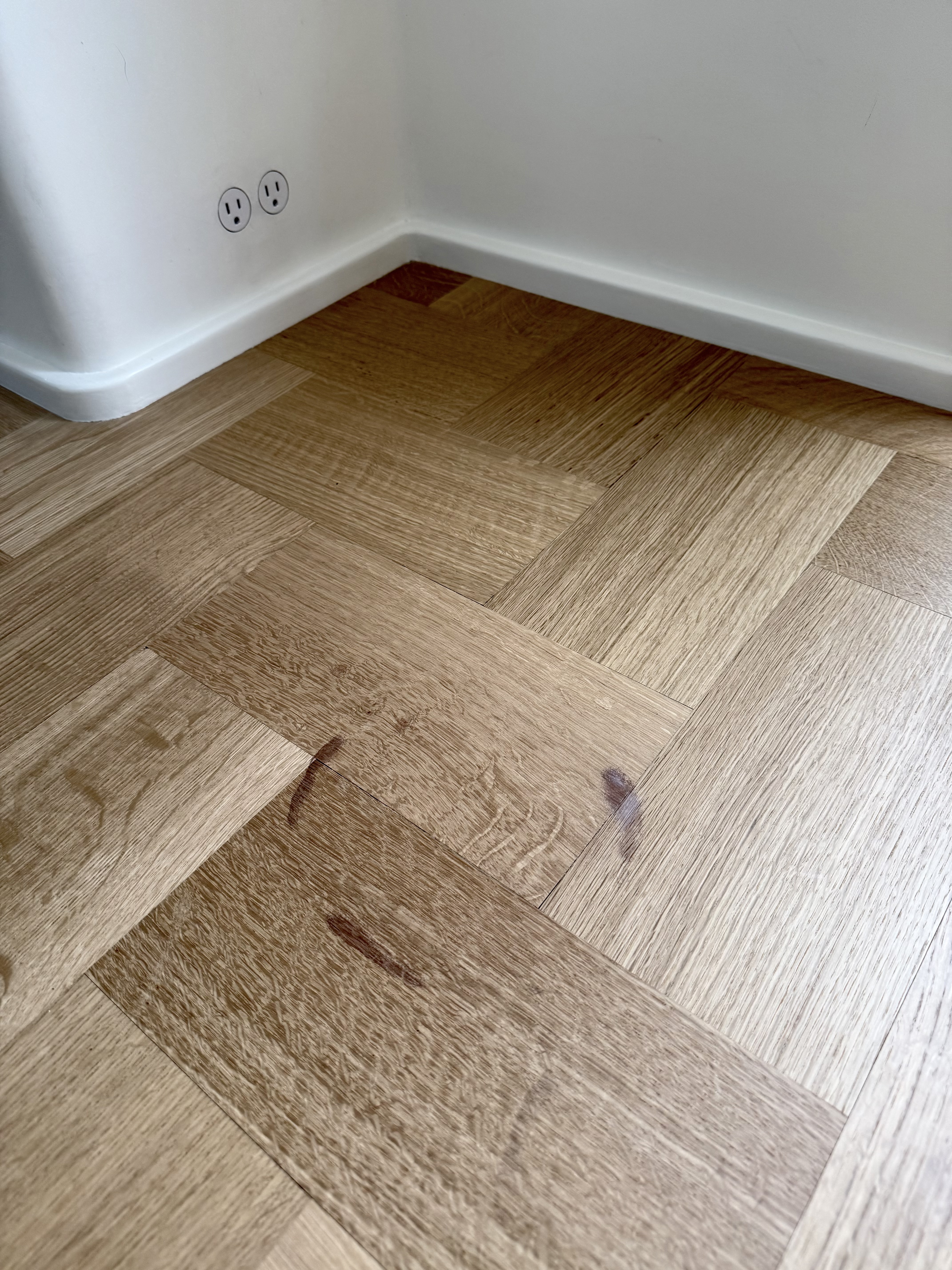 Parquet floor before stain cleanup