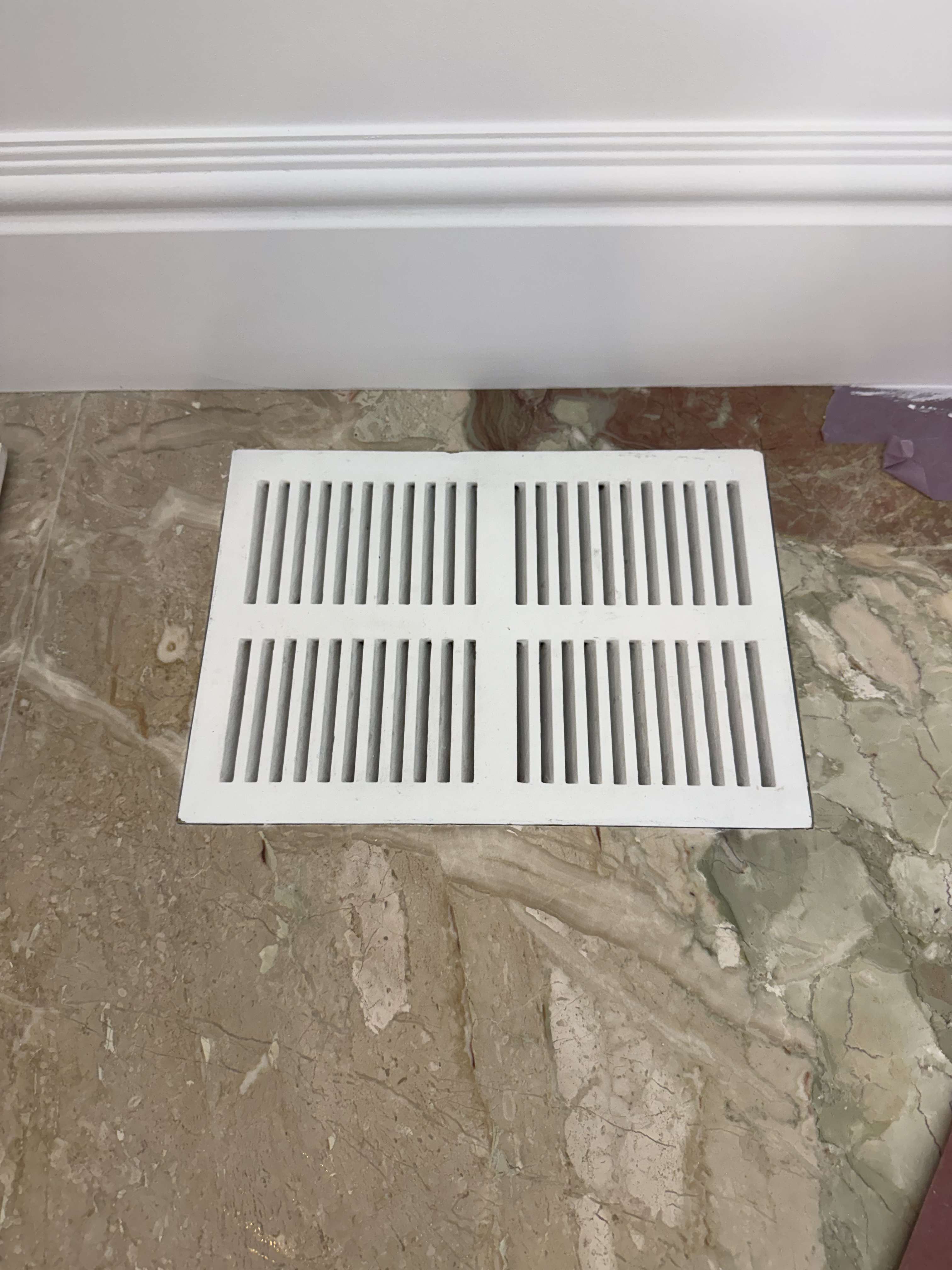 Vent grille before decorative painting